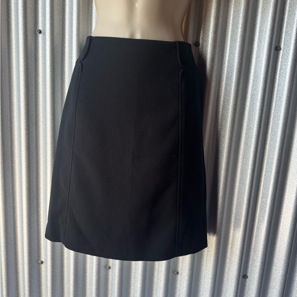 Banana Republic Black A-Line Skirt- lined. Faux flap pockets for tailored look